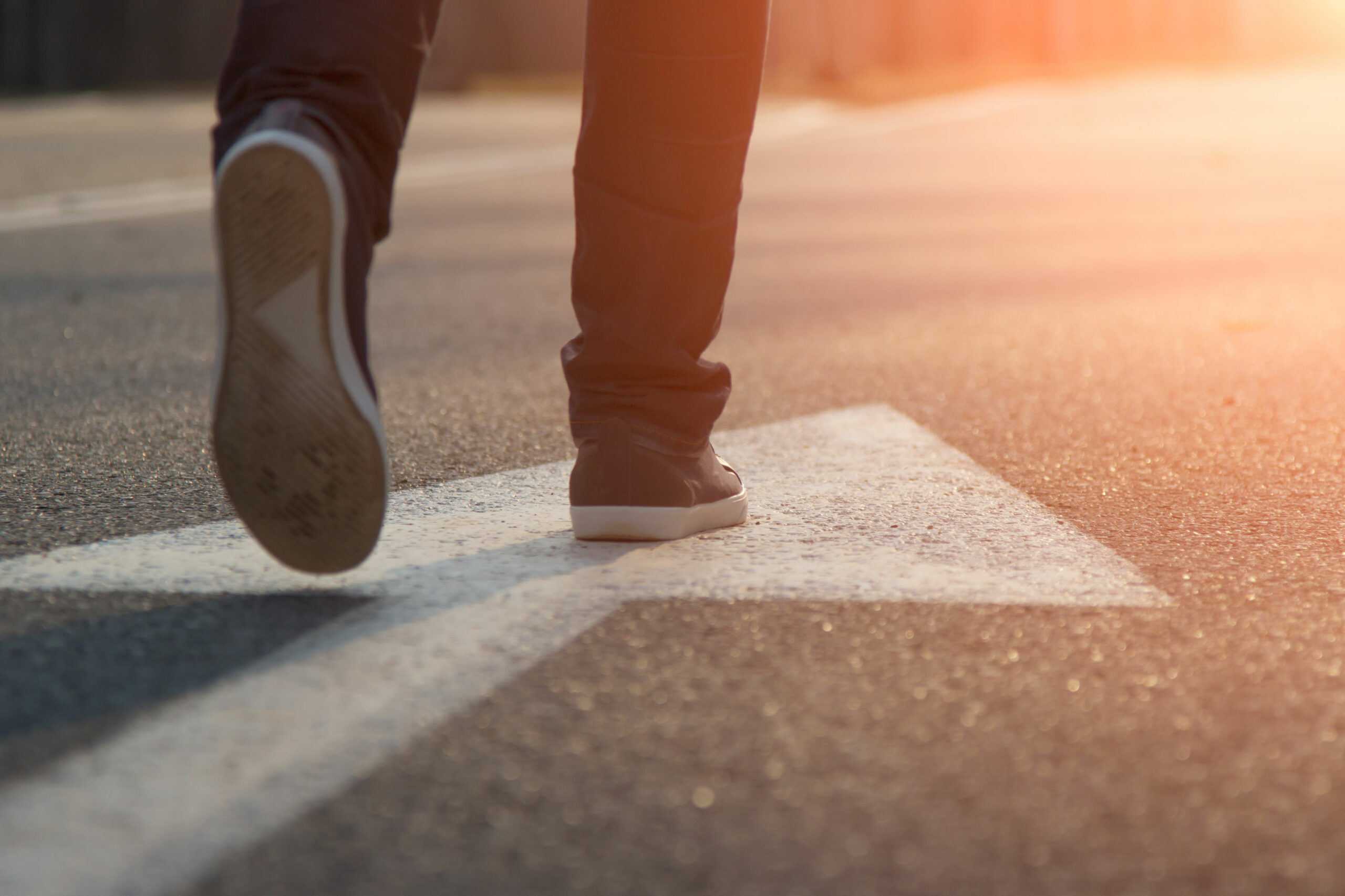 Female walk in blue Sneakers And Arrow