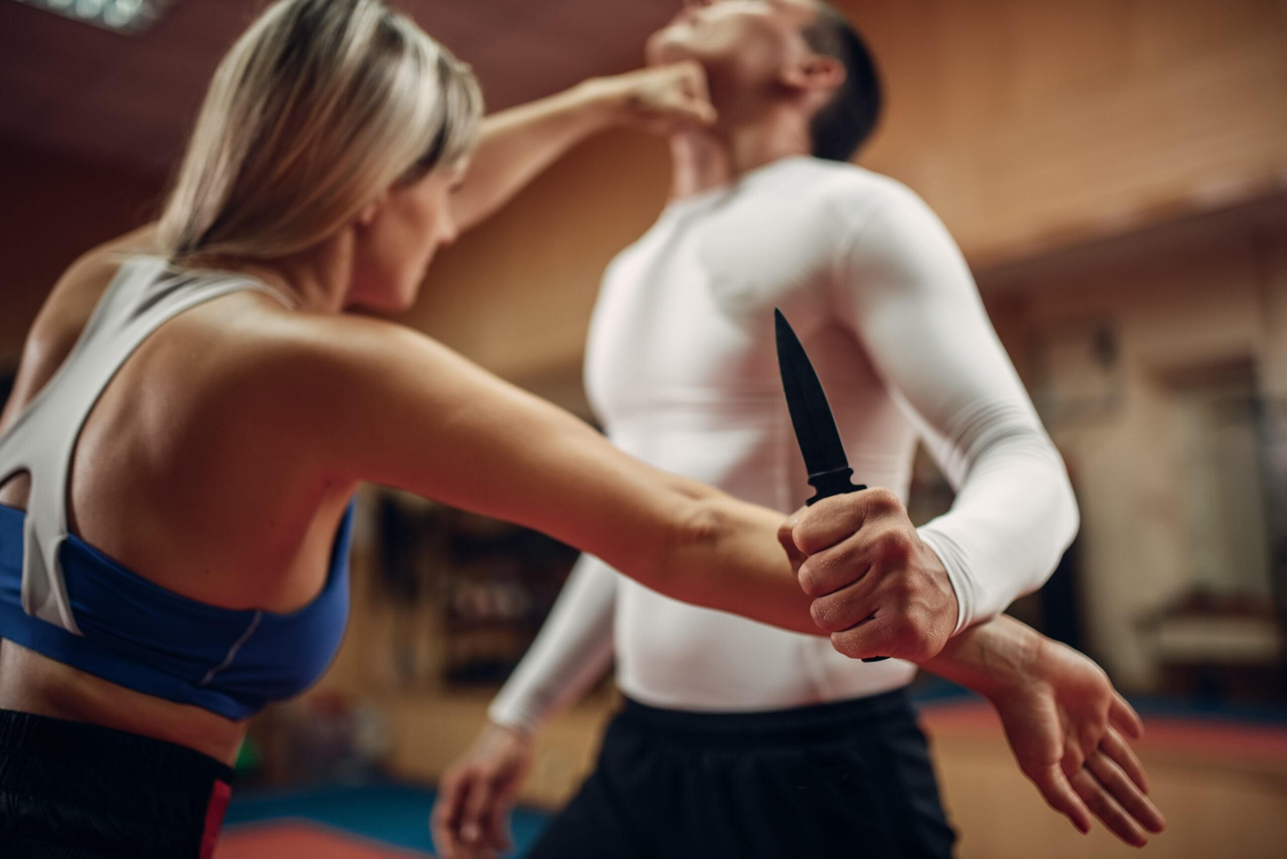 Woman makes punch to the throat, self-defense