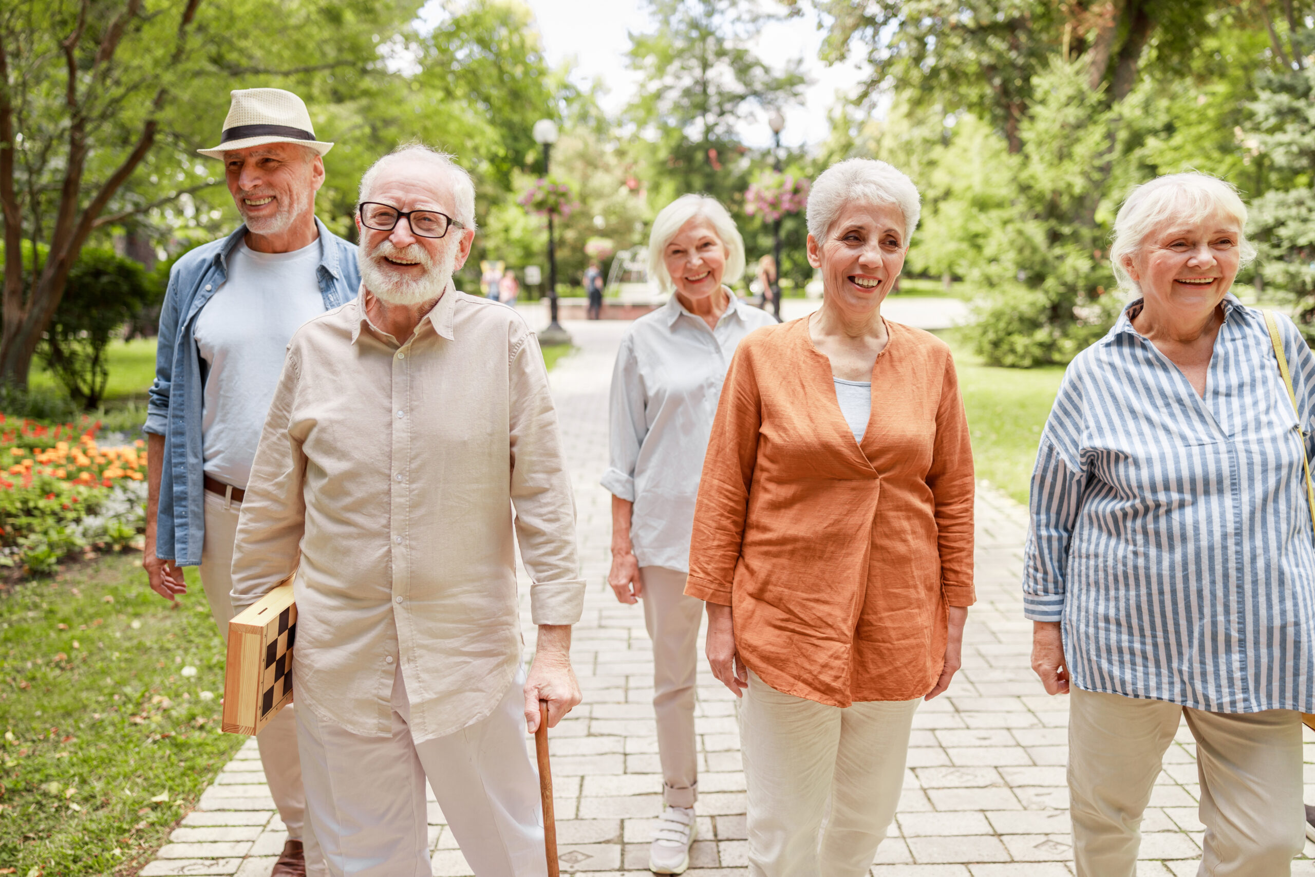 Joyful old people walking on the street